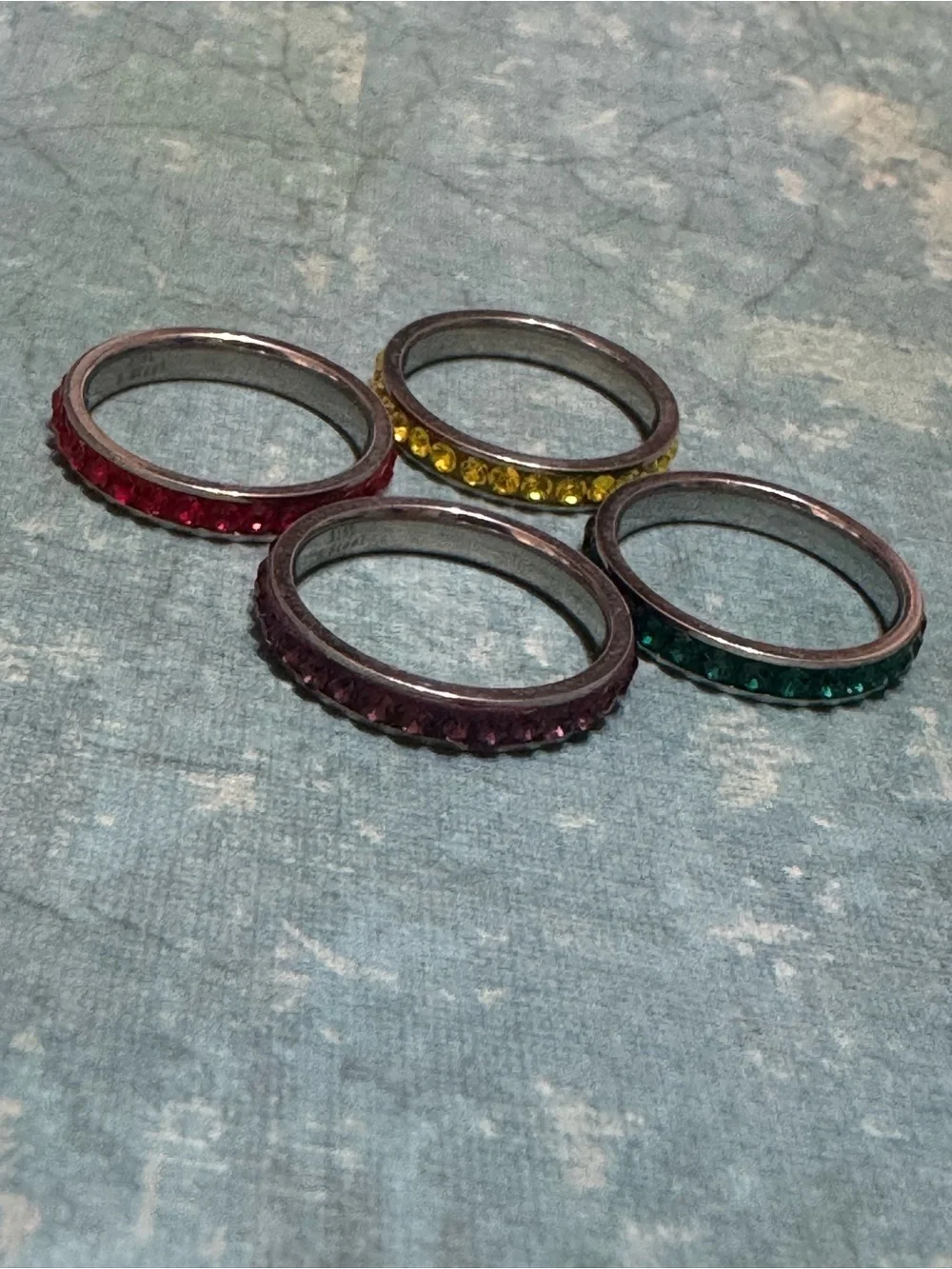 SET OF FOUR STACKABLE STAINLESS STEEL RINGS